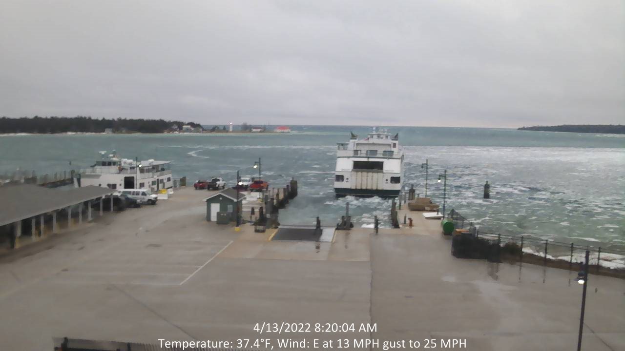 A picture containing text, sky, water, outdoor Description automatically generated