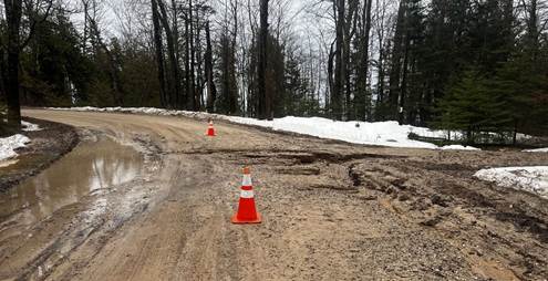 May be an image of ski slope and road