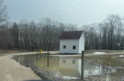 May be an image of covered bridge