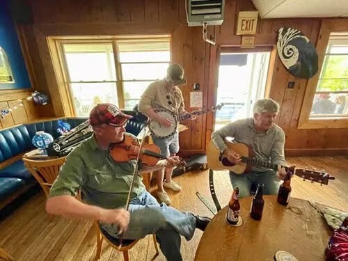 May be an image of guitar, violin and accordion